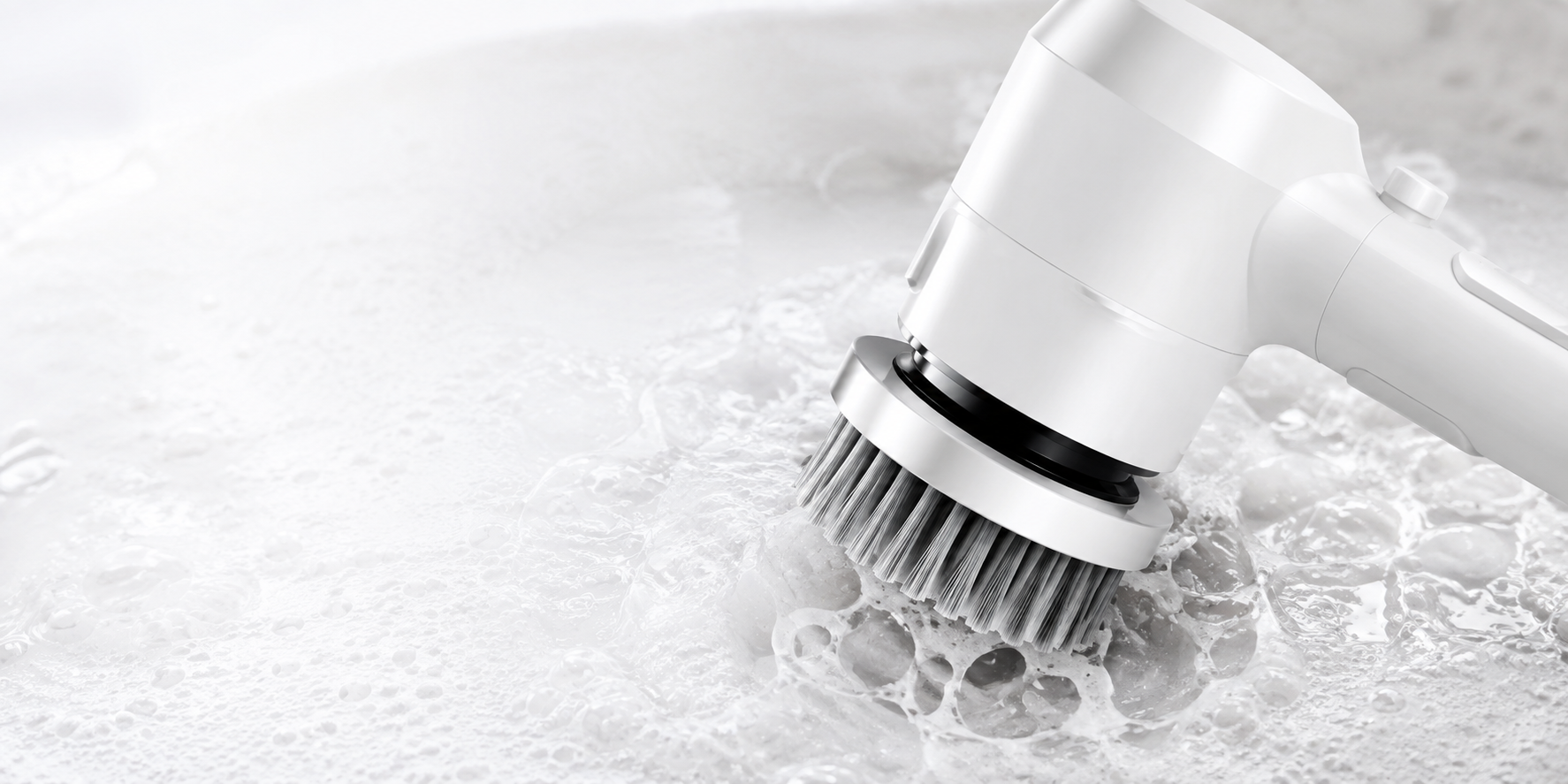 SparklePod scrubber spinning through soapy foam